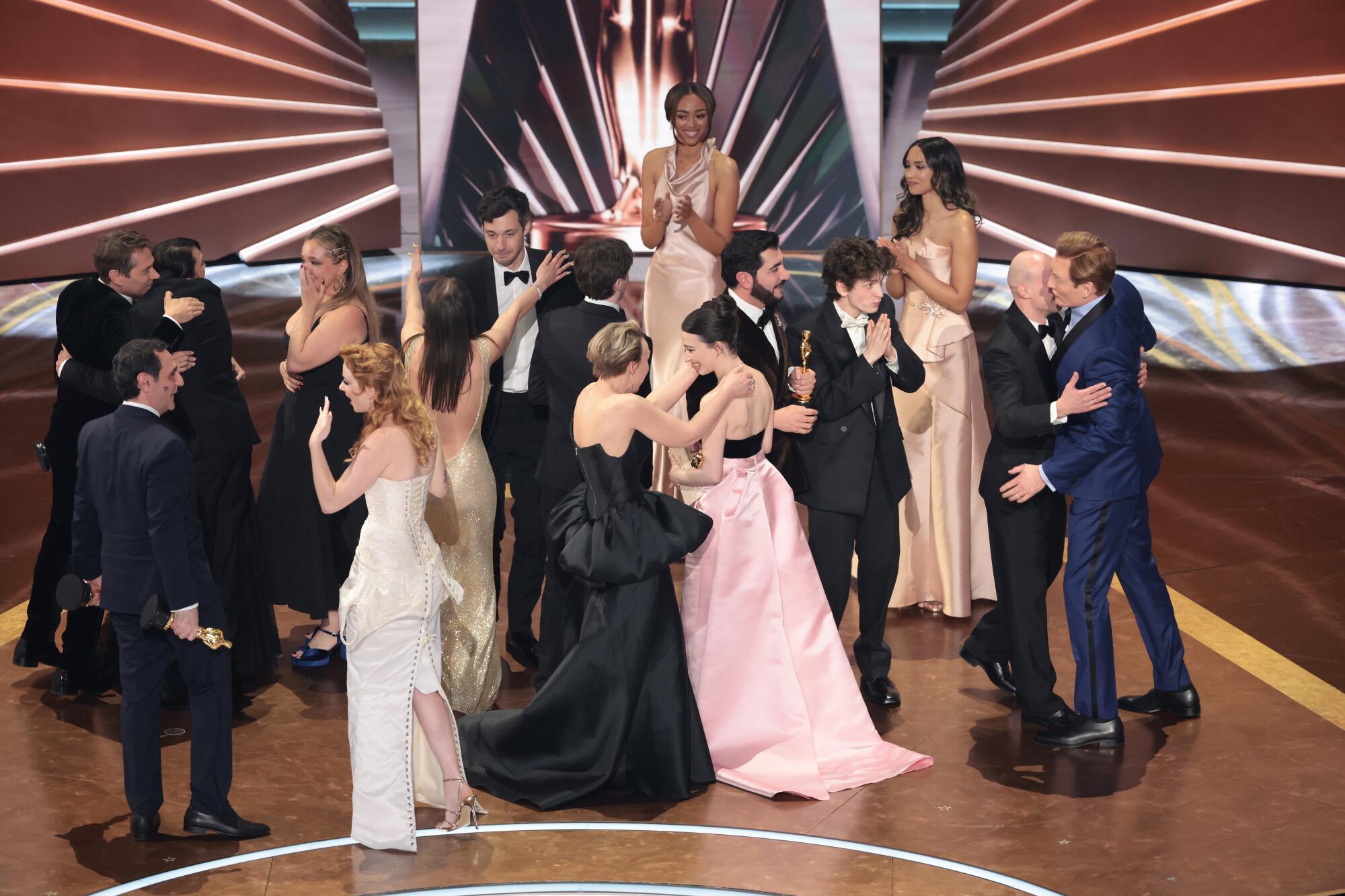 The cast and crew of "Anora" assemble after winning best picture.