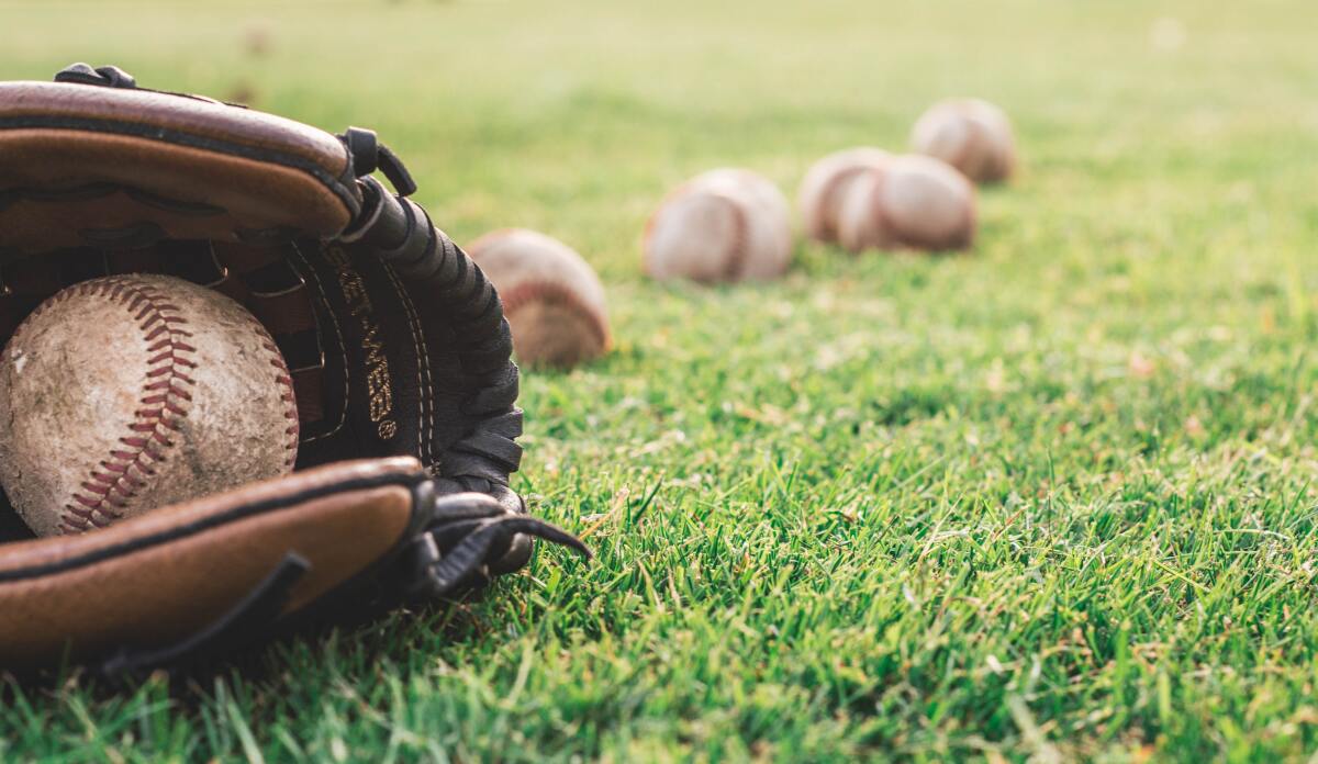 Baseballs and glove