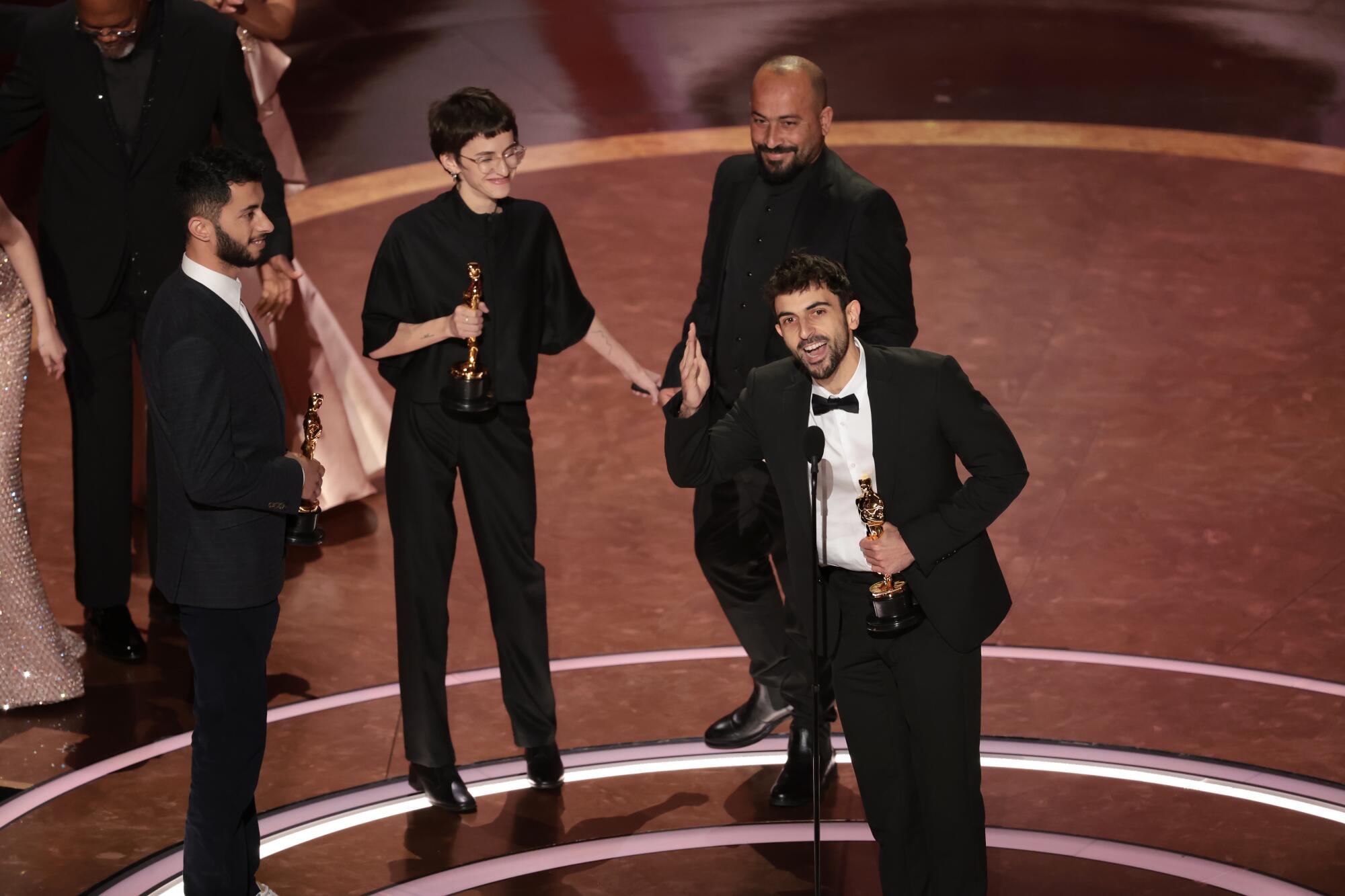 Basel Adra, Rachel Szor, Hamdan Ballal and Yuval Abraham,at the 97th Academy Awards.