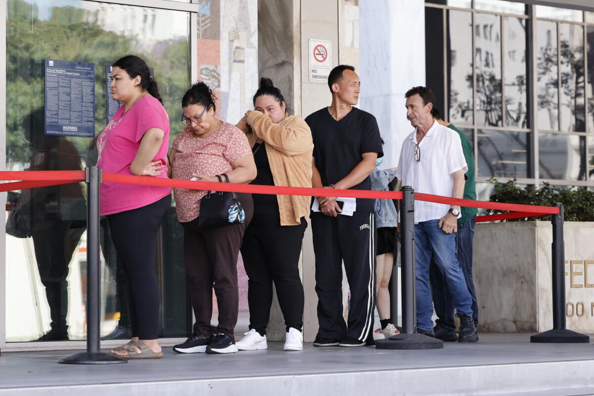 People line up for a court hearing